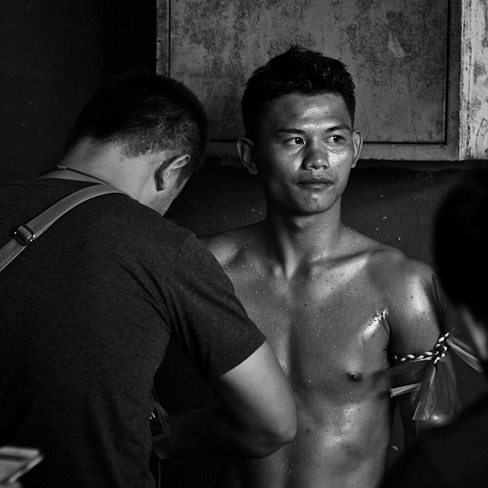 A Muay Thai fighter prepares to fight at Thai Rath Studio in Bangkok.
