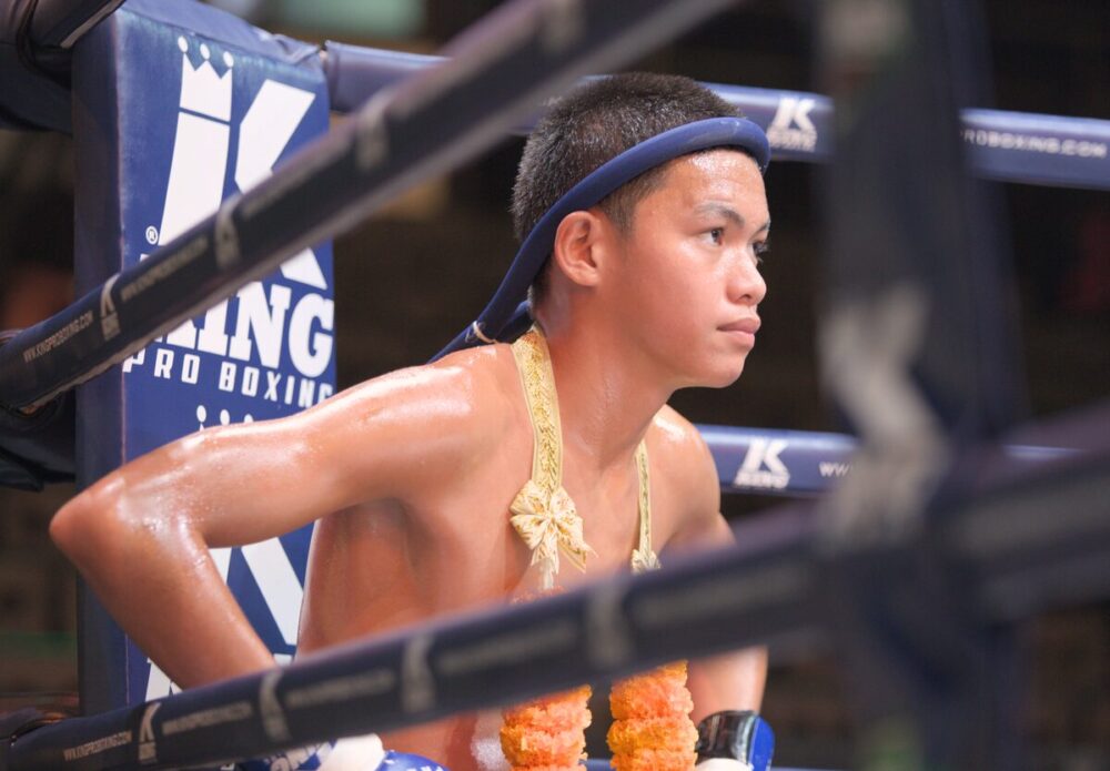 fighter sitting in corner of the ring at World Siam Stadium